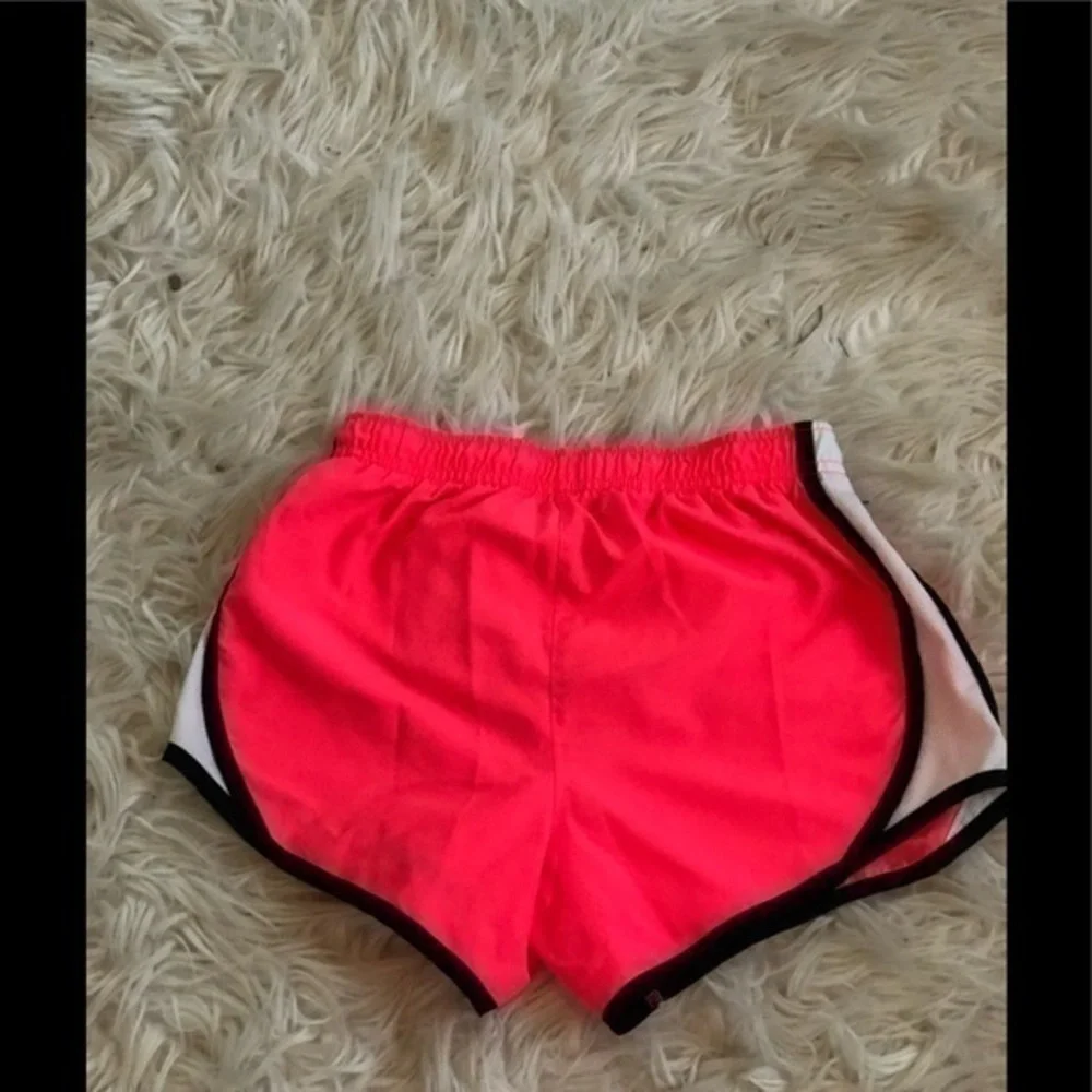 Nike pink running shorts sz med